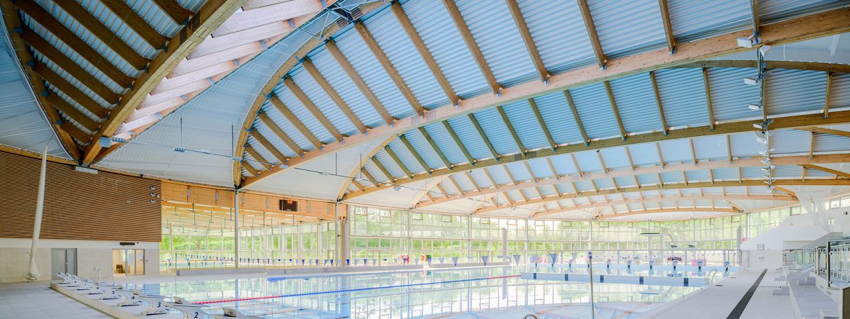 Piscine charpente bois lamellé collé